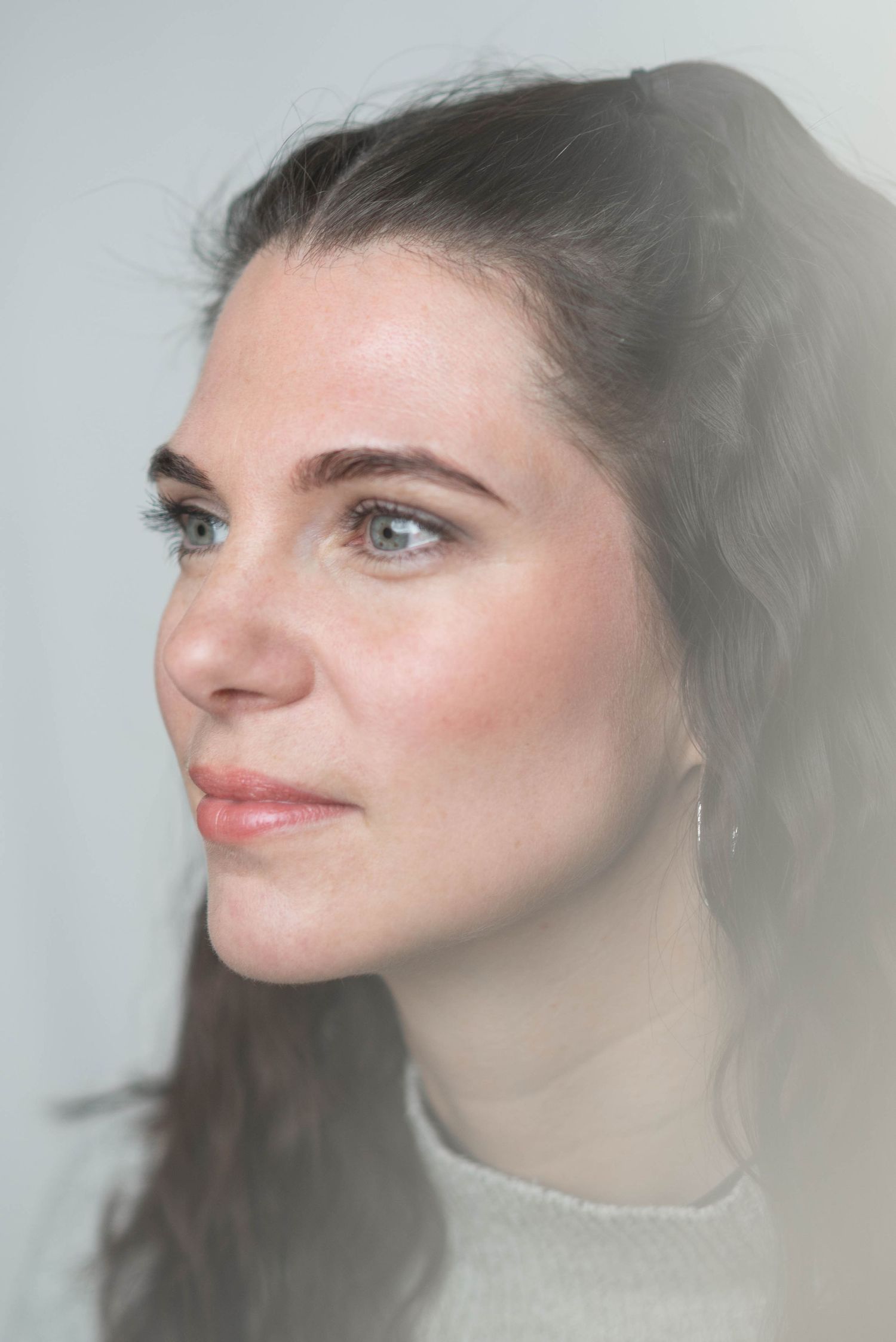 Artistic profile portraits with soft focus and dreamy lighting effects.