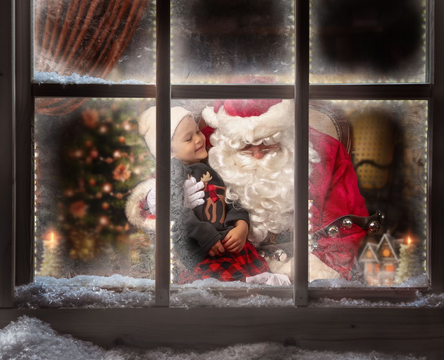 A festive winter window scene with snow and red holiday decorations creating a cozy Christmas atmosphere.