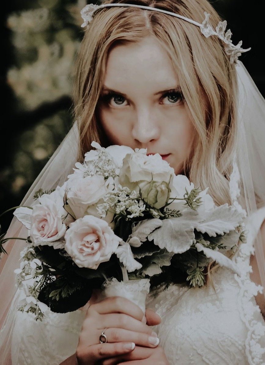 Dreamy wedding portrait montage showing bride in lace dress with pink and white rose bouquet against dark background.