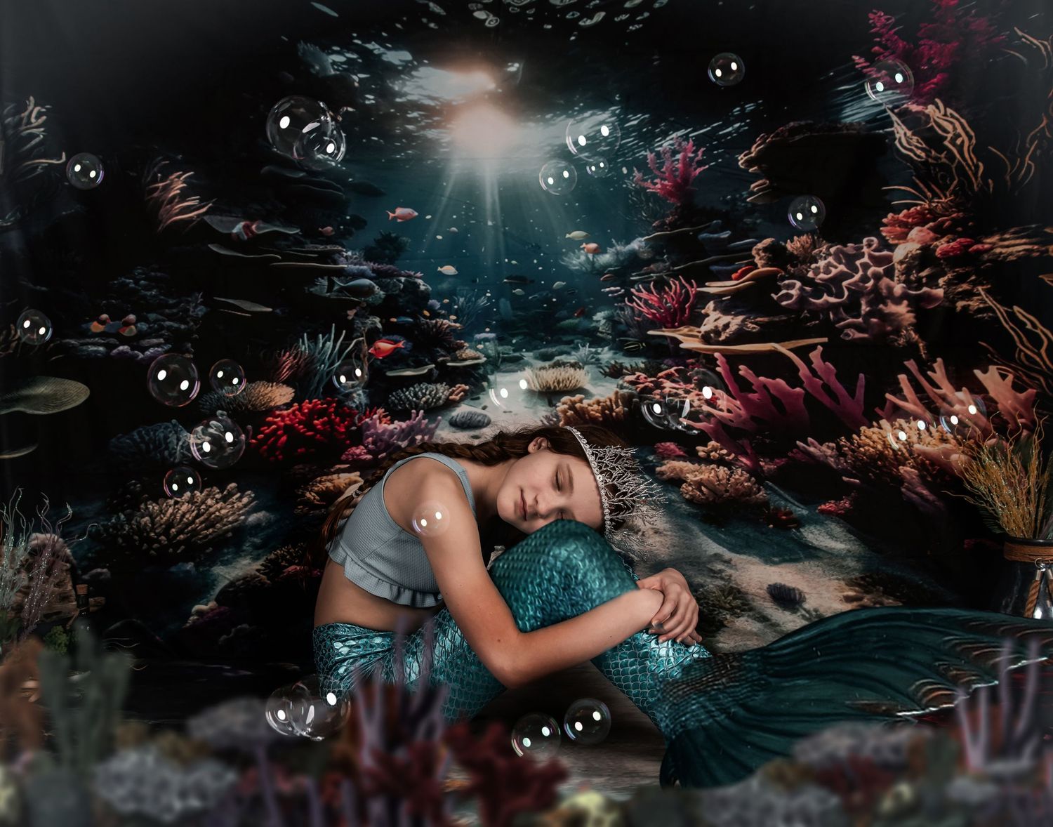 A dreamy underwater scene with bubbles and dark red flowers creating a mystical aquatic atmosphere.