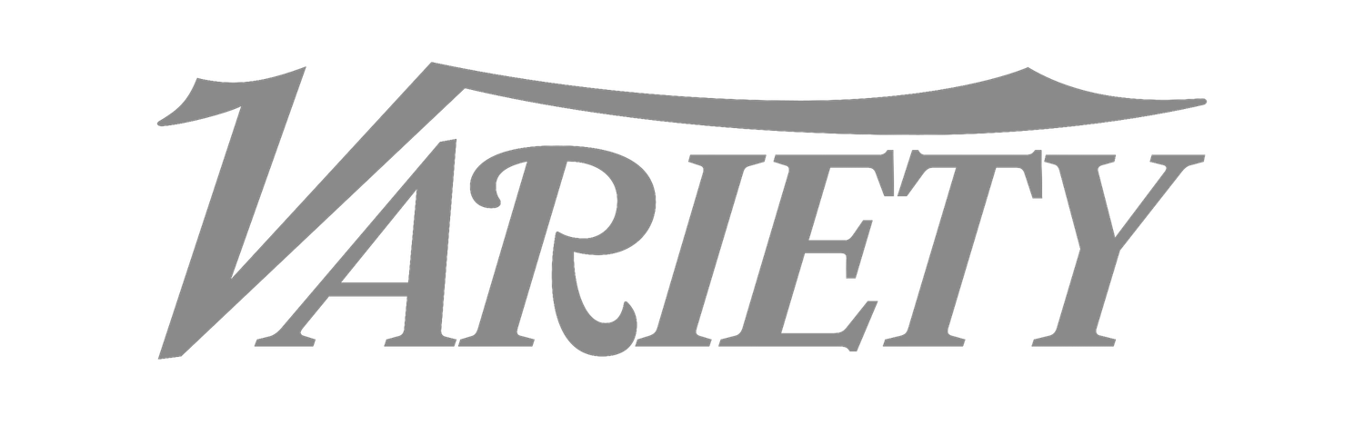 Variety entertainment industry magazine logo in bold gray serif font.