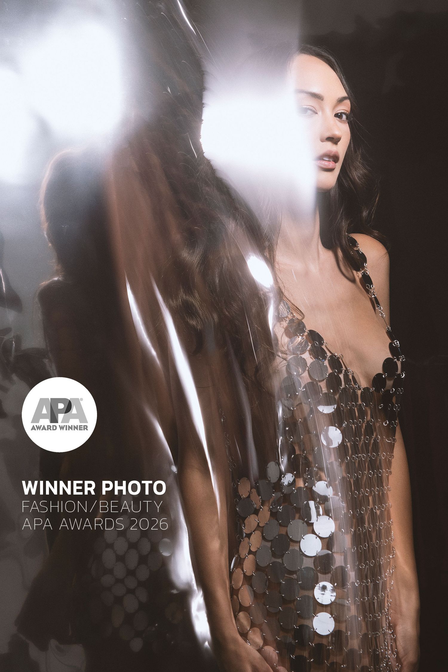 Award-winning fashion photo of a woman in a silver sequin dress, APA Awards 2026 Fashion/Beauty Winner.