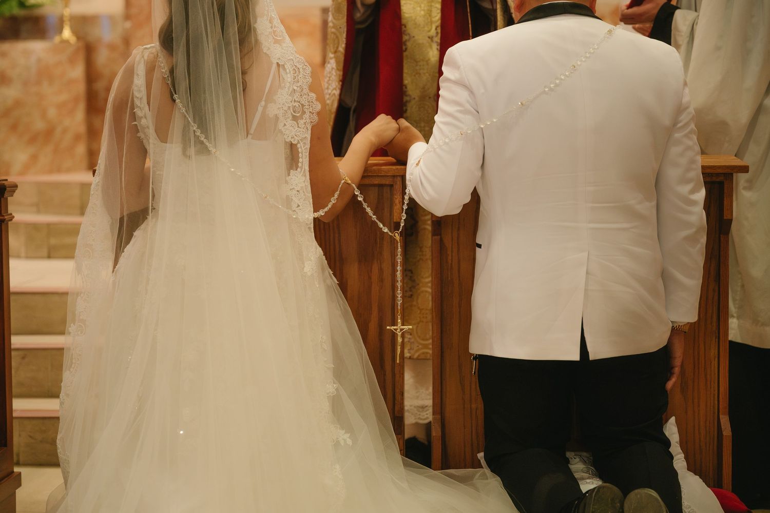 Socal catholic couple getting married at Saint John the Baptist Catholic Church in Costa Mesa