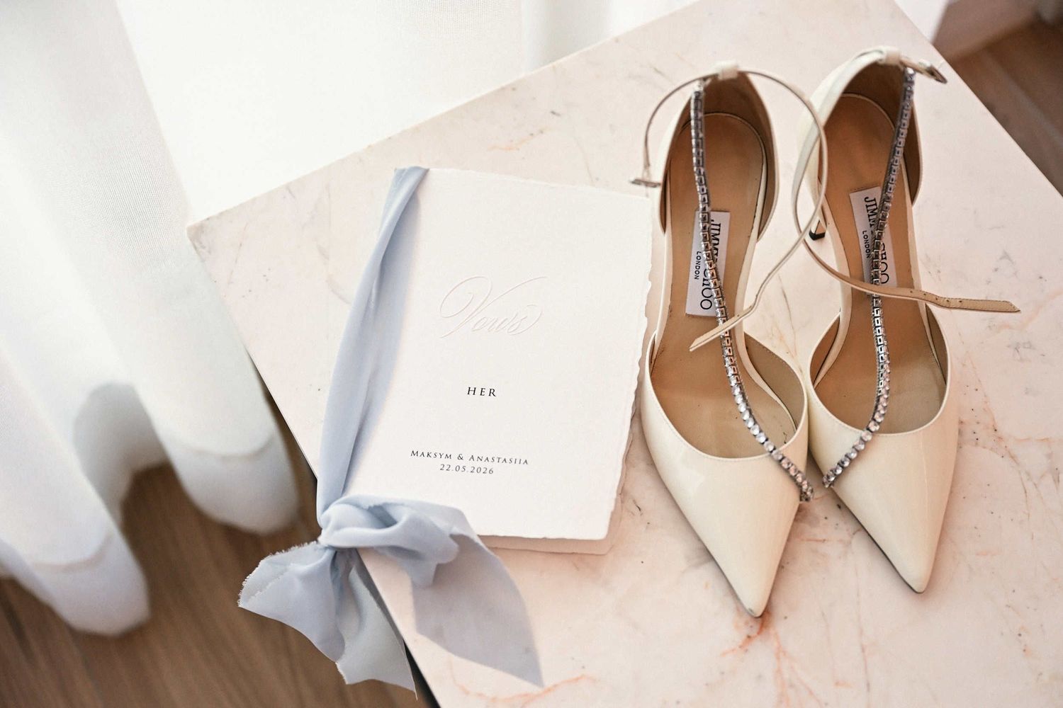 Bridal Jimmy Choo shoes and a personalized vow book for a destination wedding planned at Finca El Senyoret