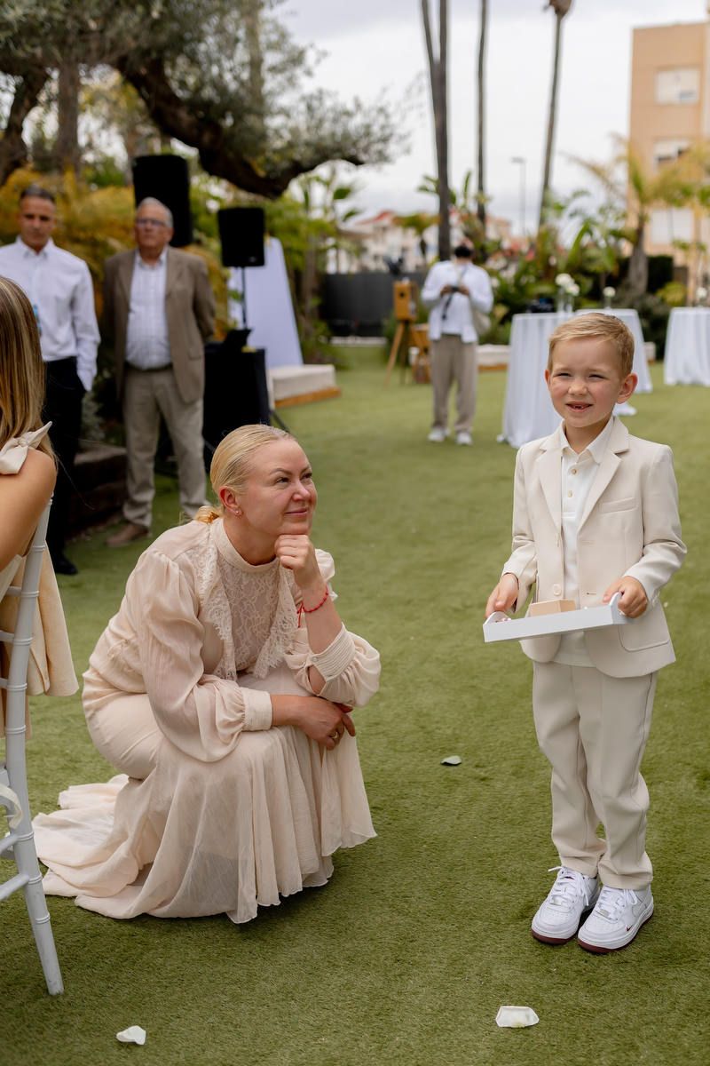 Wedding planner Olga Prudko organizing an outdoor wedding ceremony in Spain for an international couple.