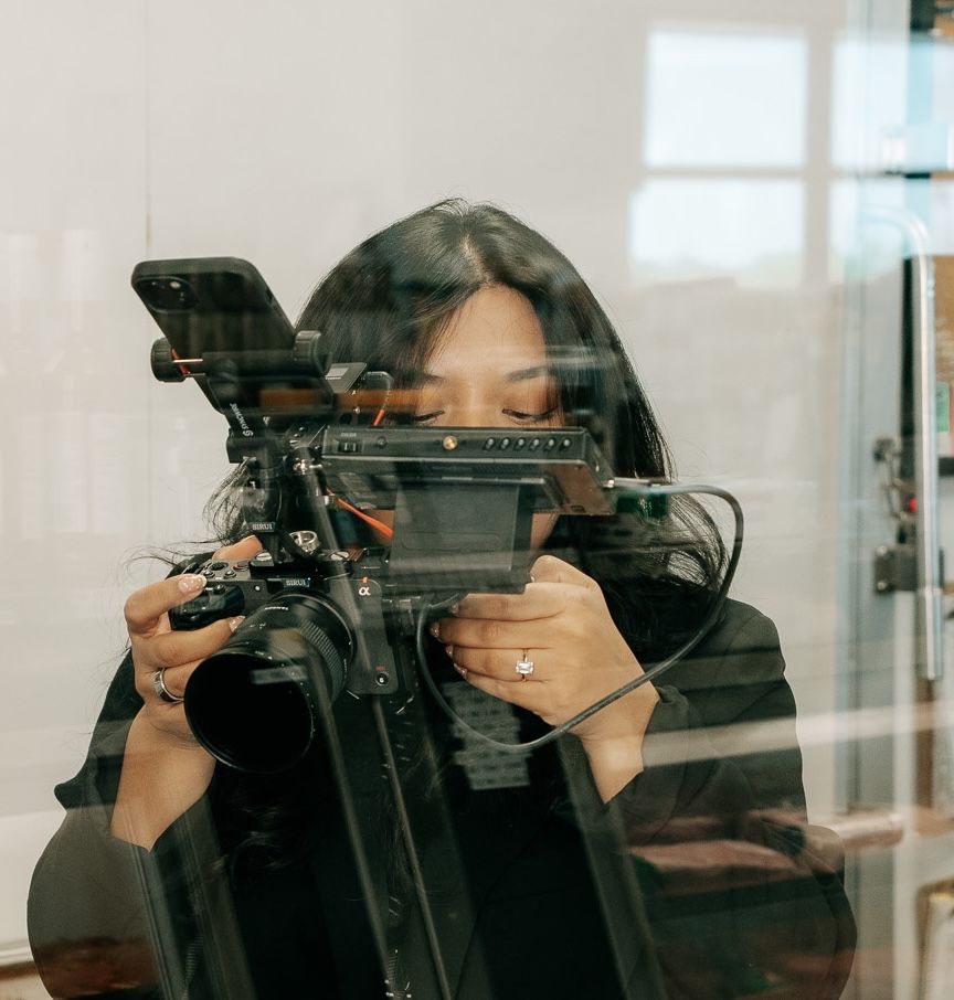 Creative professional filming with a cinema camera during a church production