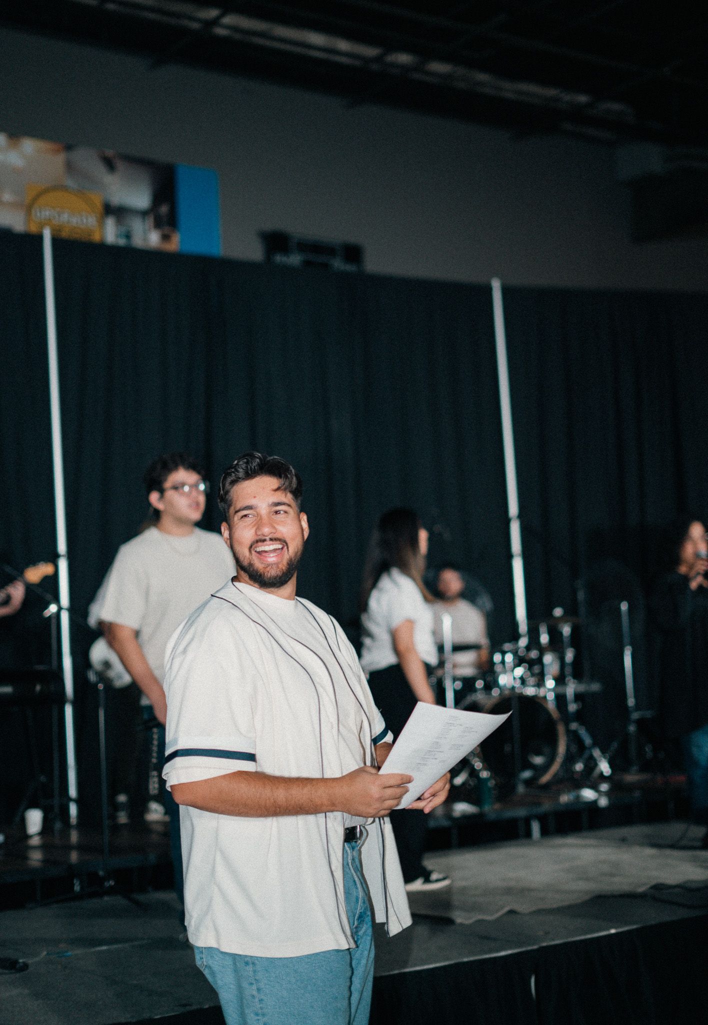 Church speaker Kyle Howeth on stage during a live service filmed by Arketype Studio