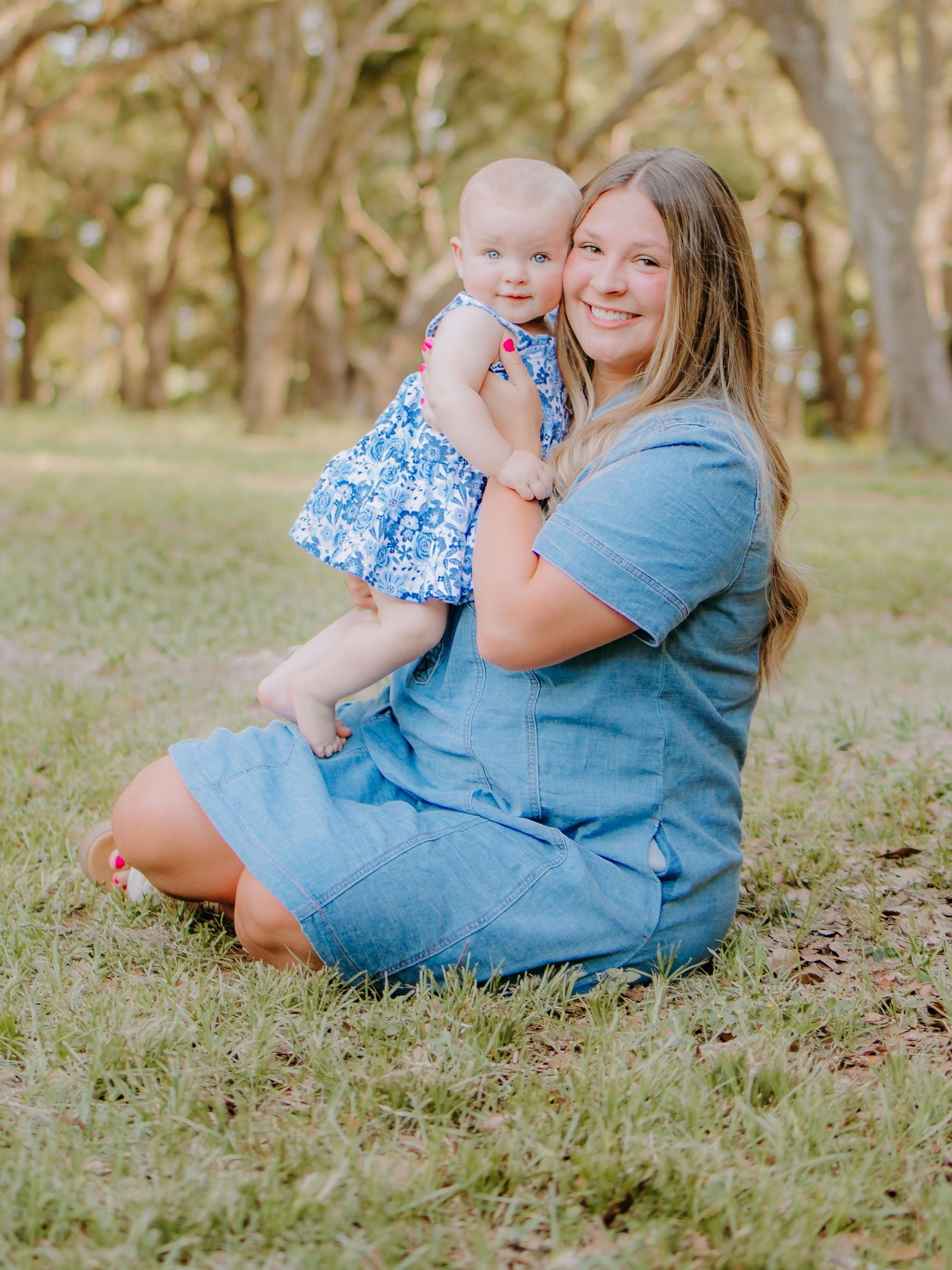 Mother and daughter sitting together during an outdoor photography session