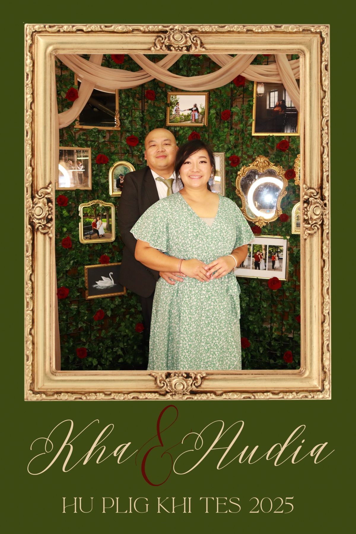 Couple posing in decorative frame at Kha & Nudia Hu Plig Khi Tes 2025 wedding celebration with floral backdrop.