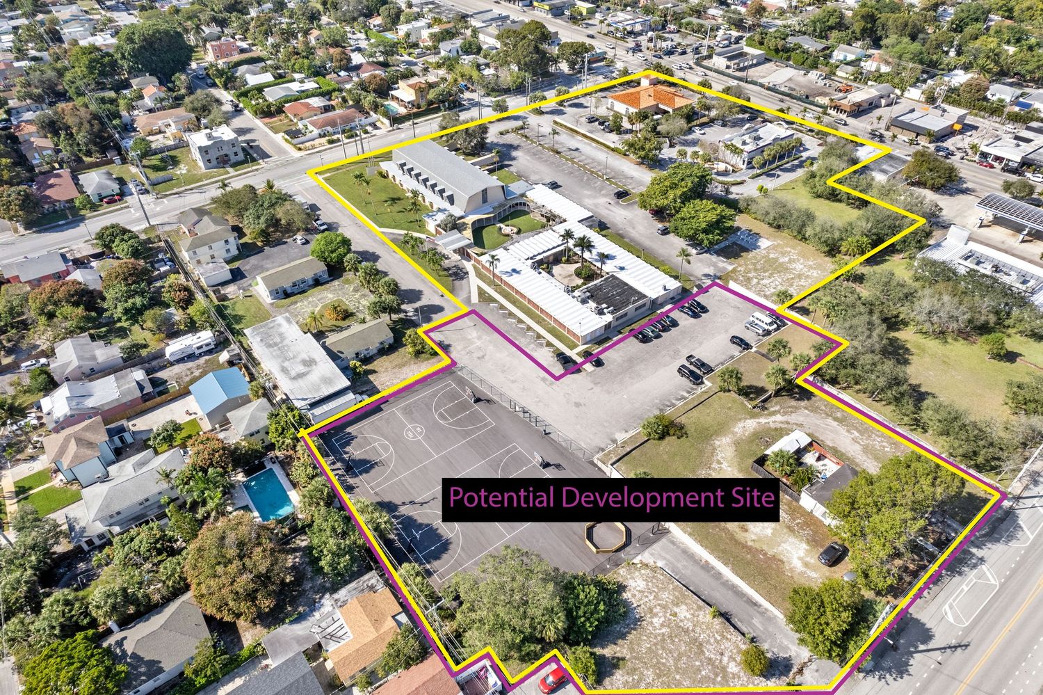 Aerial view of a potential development site outlined in yellow in a Palm Beach Real Estate aerial views of downtown West Palm Beach