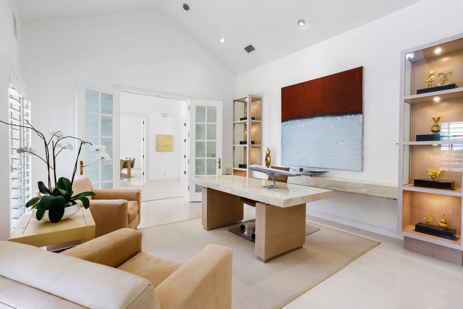 Modern home office, and high vaulted ceilings.Professional real estate photos in Palm Beach, Florida by Brodiganphotography.com