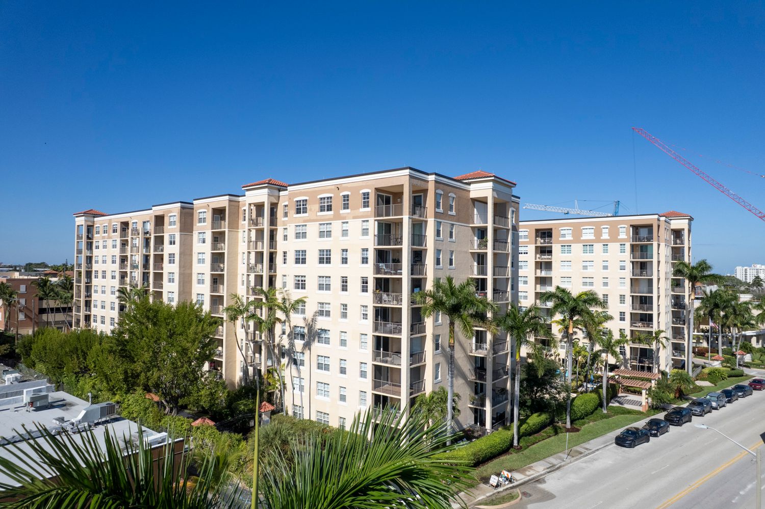 Aerial view of luxury waterfront high-rise condos and construction cranes along a west Palm Beach coastline brodigan photography.com