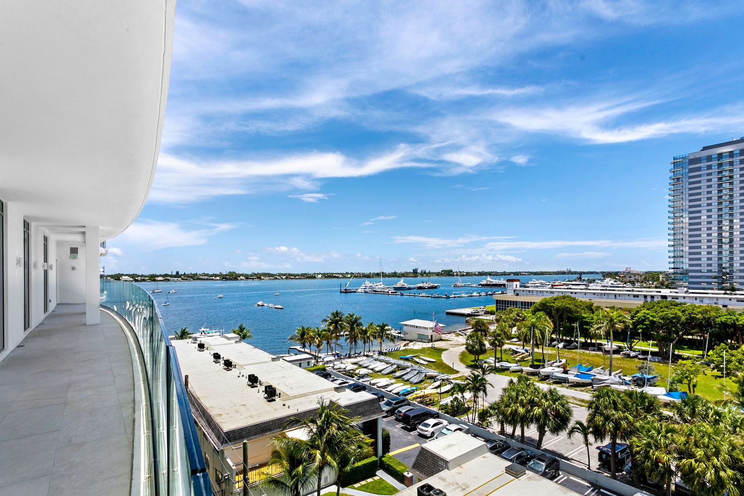 Expansive waterfront balcony view  Professional real estate photography in Palm Bech, Florida. brodiganphotograpy.com
