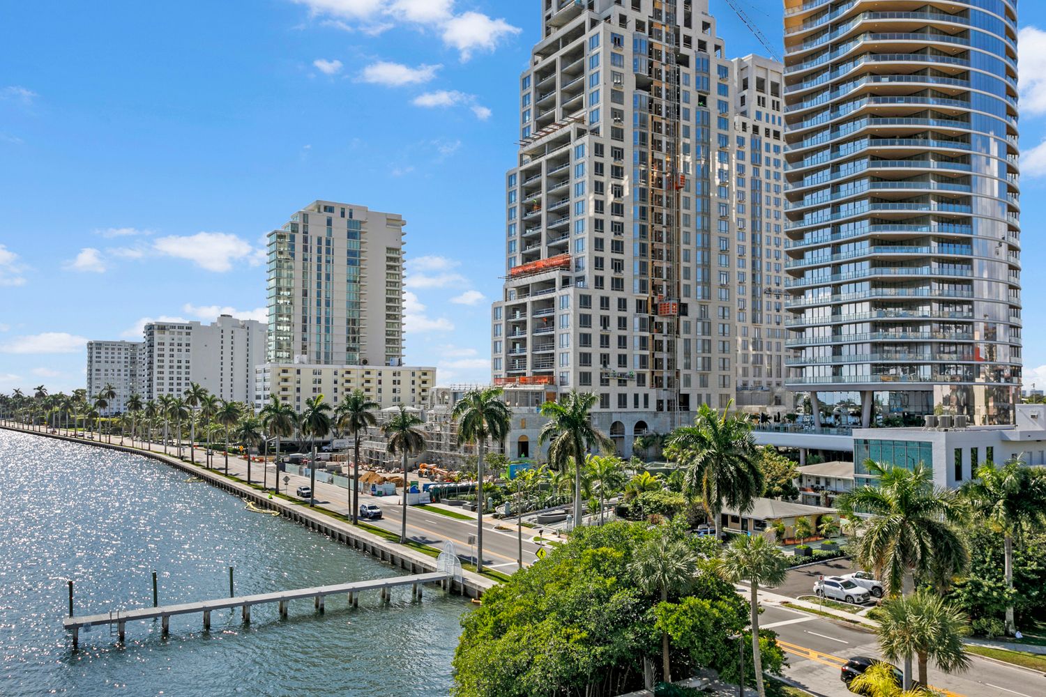 Stunning aerial view of West Palm Beach waterfront with luxury high-rise towers and Intracoastal Waterway. brodiganphotograpy.com