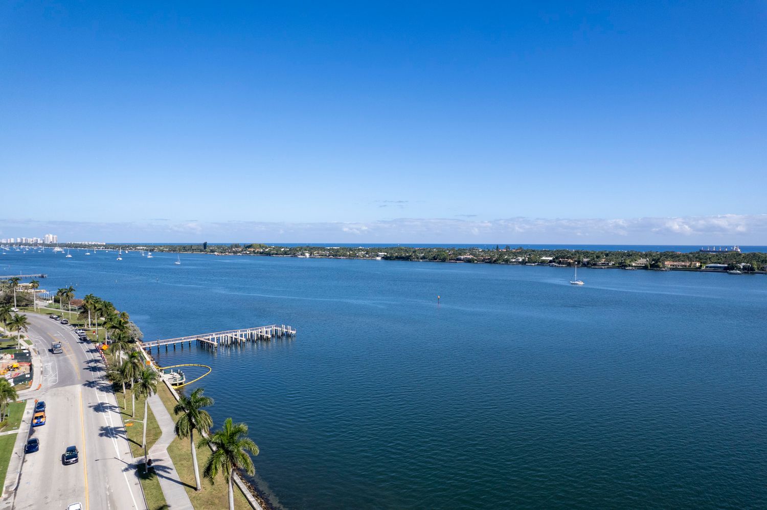 Aerial view of luxury waterfront high-rise condos  along a west Palm Beach coastline by brodigan photography.com