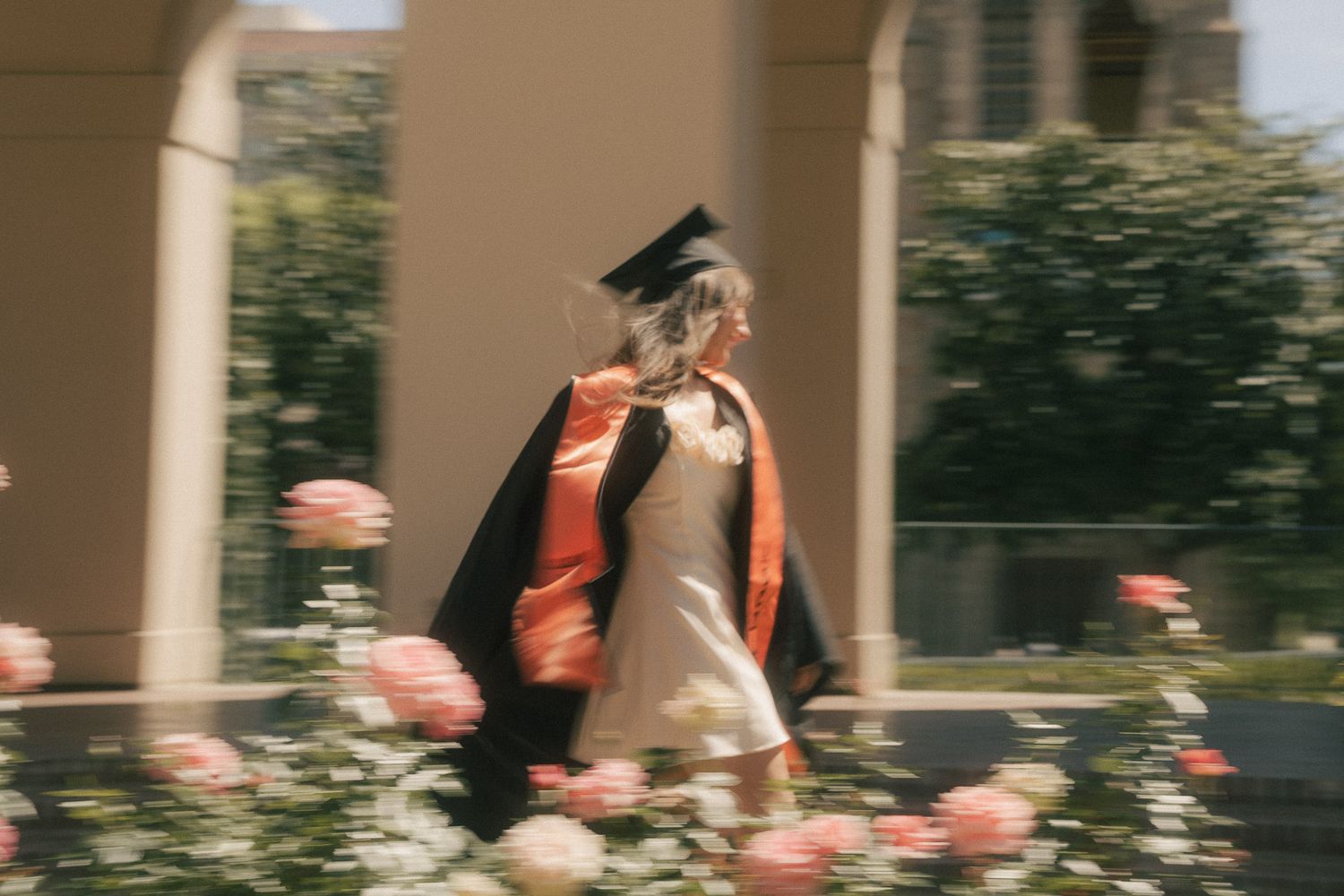 Pasadena City Hall Graduation photoshoot running across roses