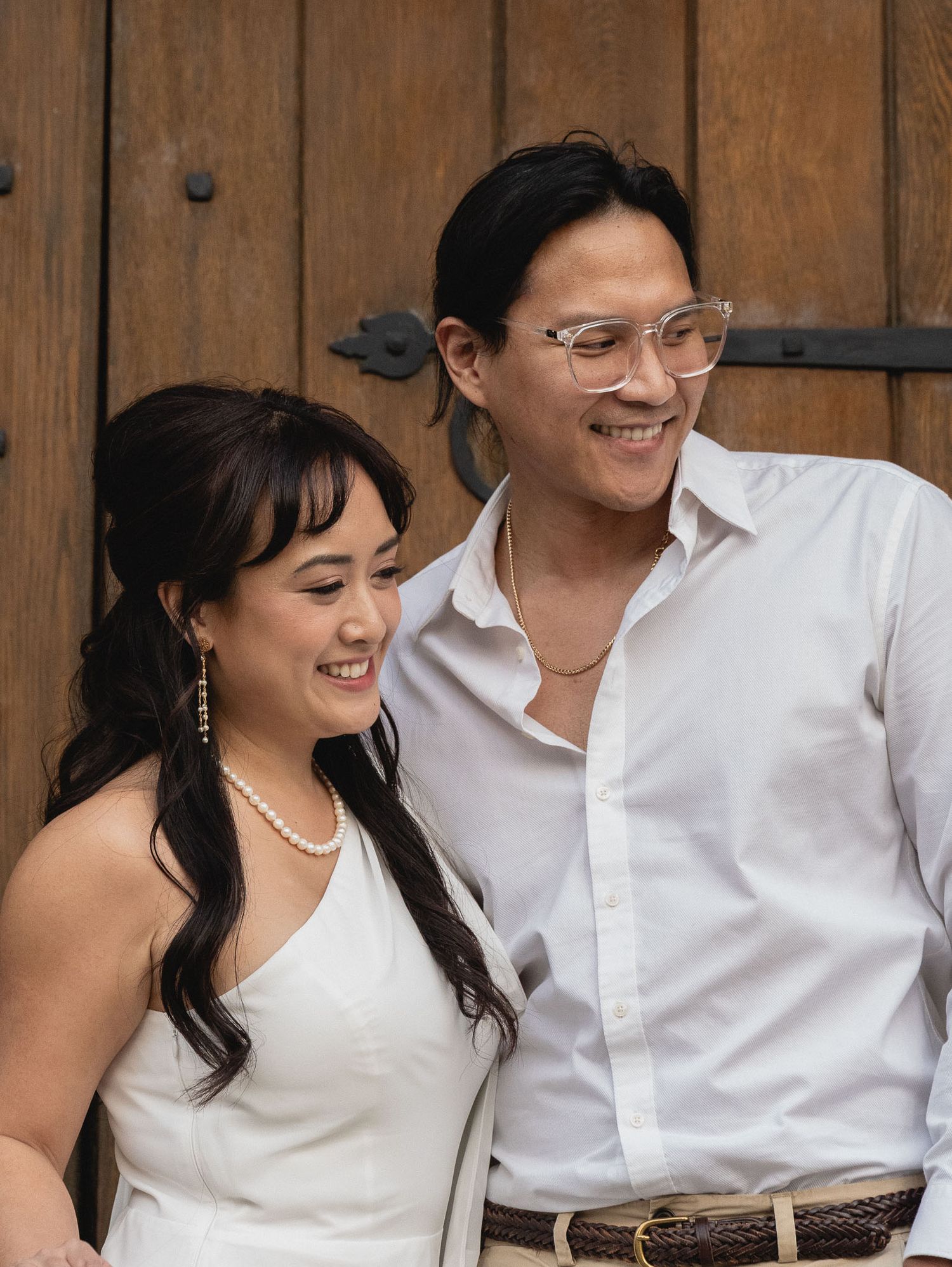 Pasadena City Hall Engagement Session of Couple looking at their dogs