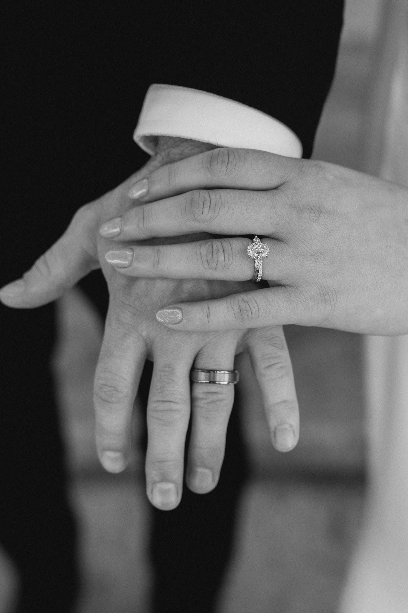 Black and white detail photo of wedding rings captured by a Pasadena wedding photographer