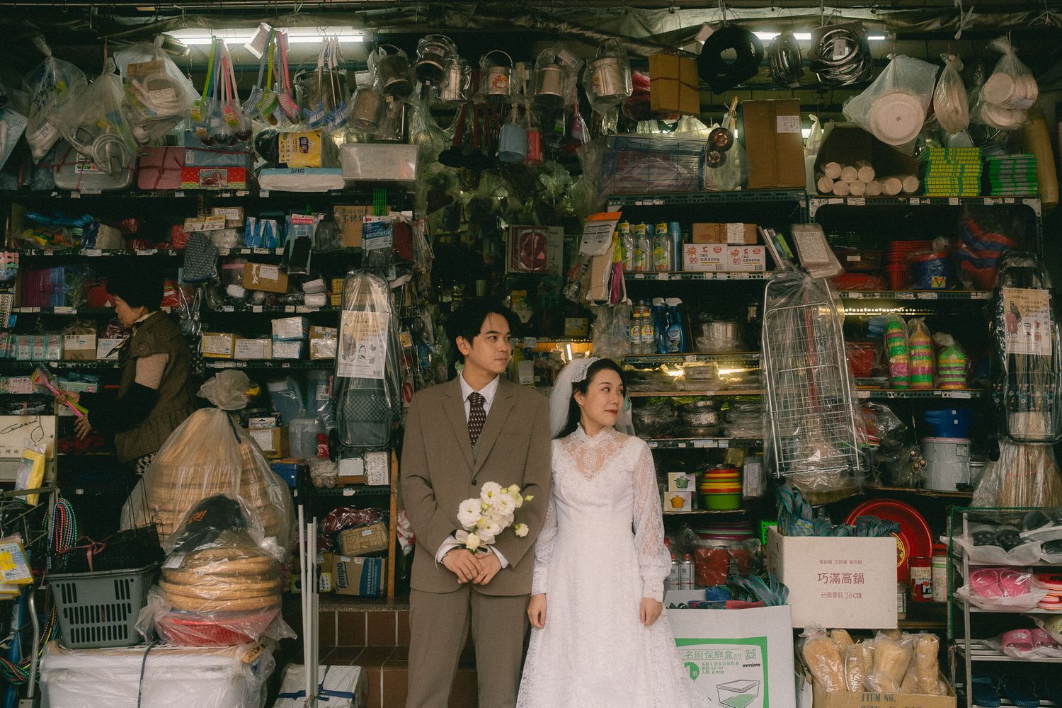 Los Angeles Hong Kong Style Couple Photoshoot in Chinatown in front of a traditional asian store