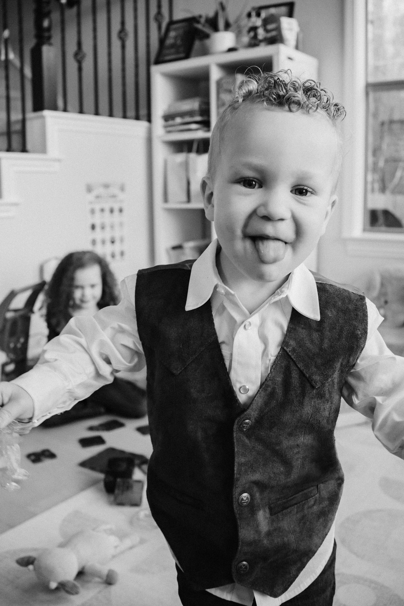 Black and white photos showing playful expressions and gestures.