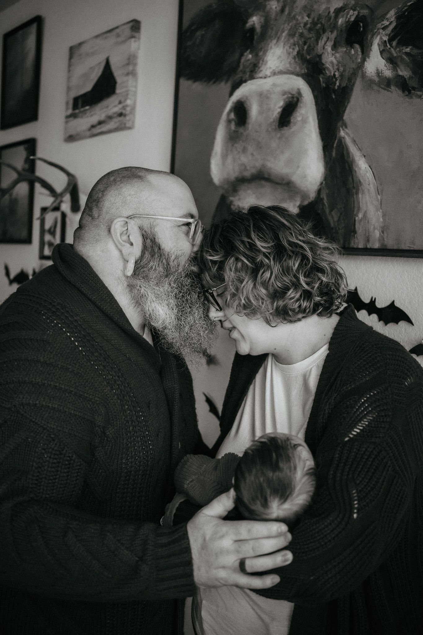 A black and white photo sequence showing two people in close proximity sharing an intimate moment.