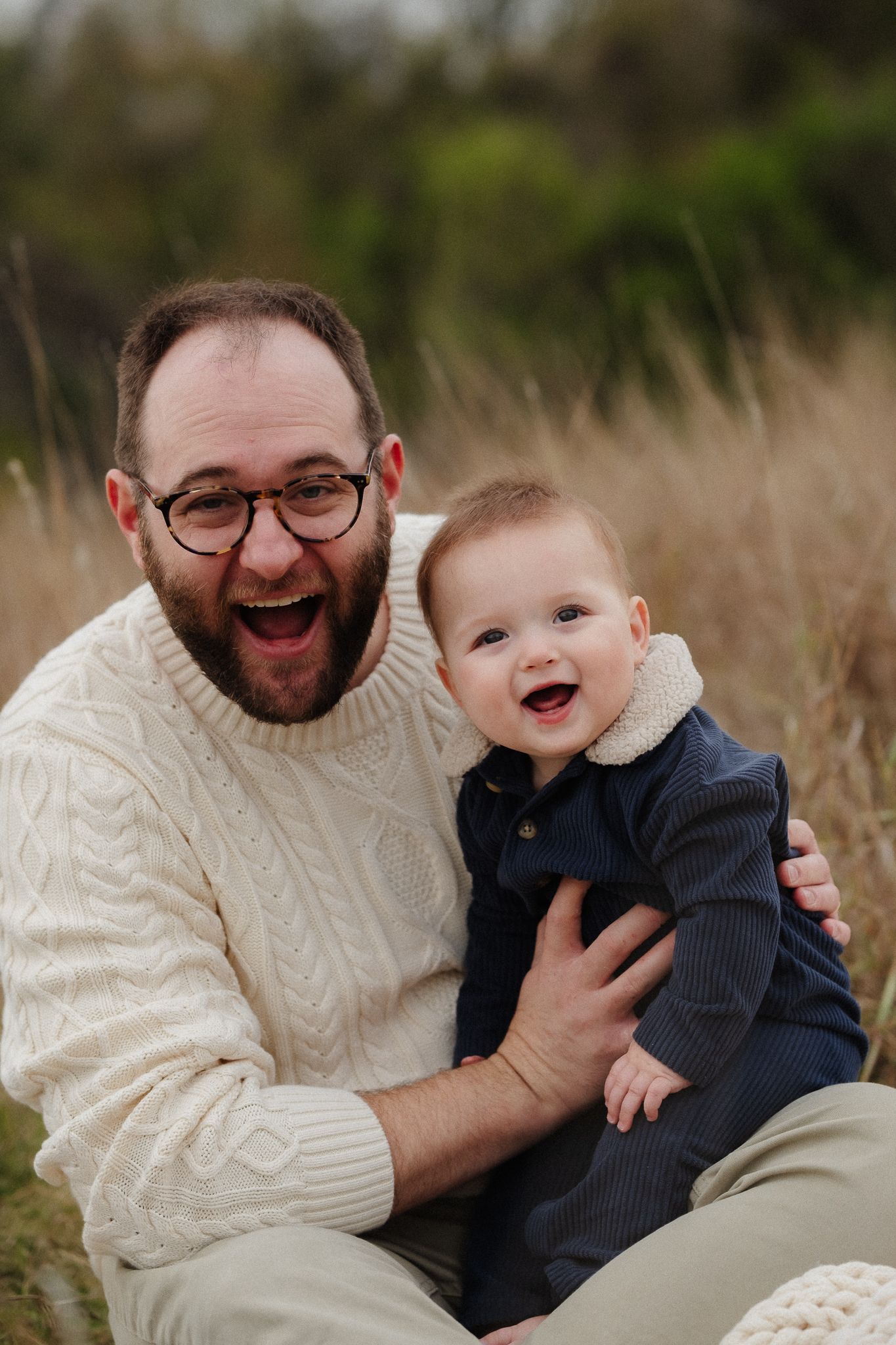 A heartwarming sequence of candid moments showing playful interaction and laughter in an outdoor field setting.