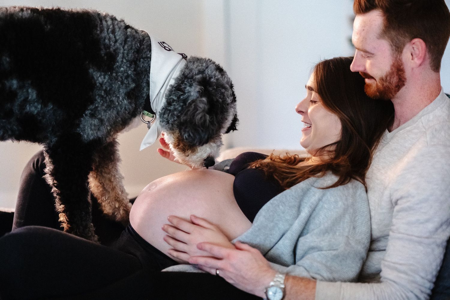 A couple shares intimate moments in a black and white photo sequence showing affection and connection.