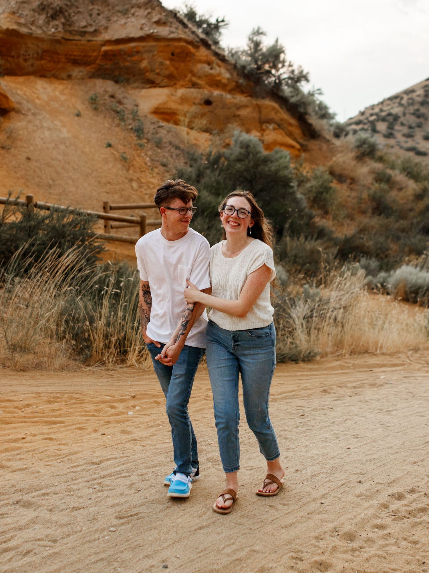 couple holdng hands and walking together