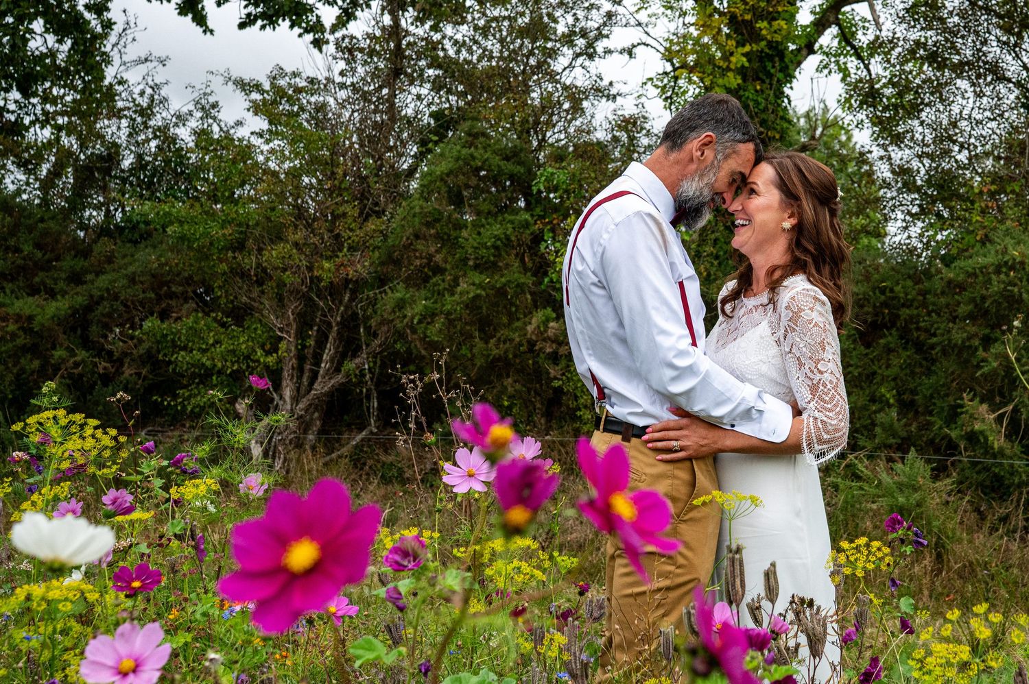 documentary wedding photography waterford cork happy couple couple portraits hugging smiling love connection wild flowers