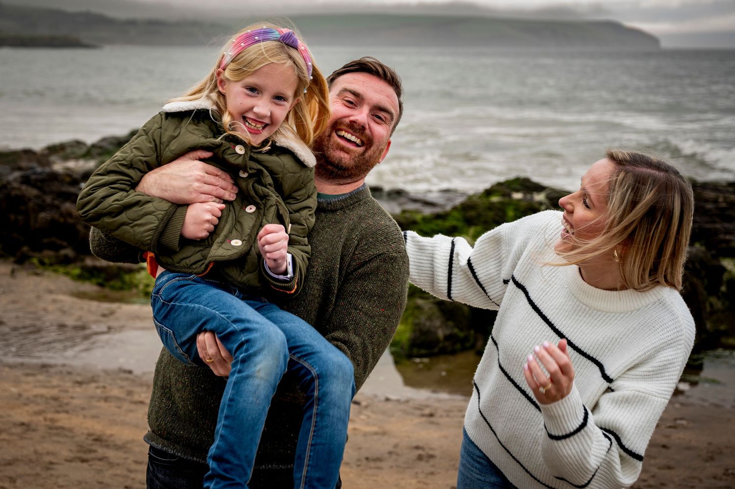 eleanor barry family photographer waterford family playing on the beach laughing fun
