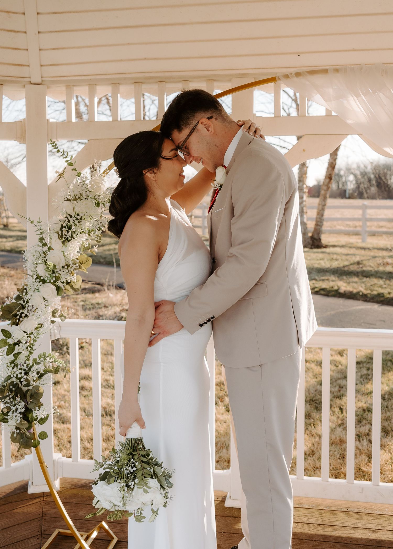 Bride and Groom holding each other