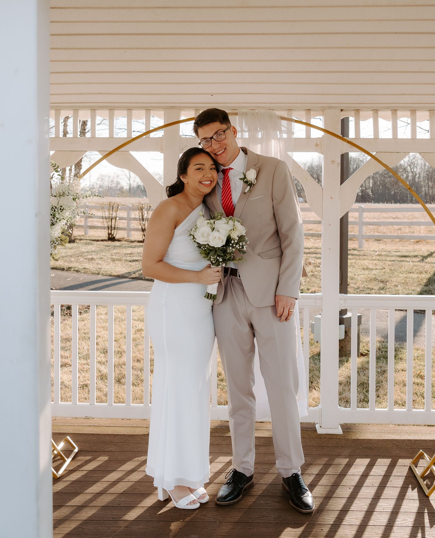 Bride and Groom smiling for the camera