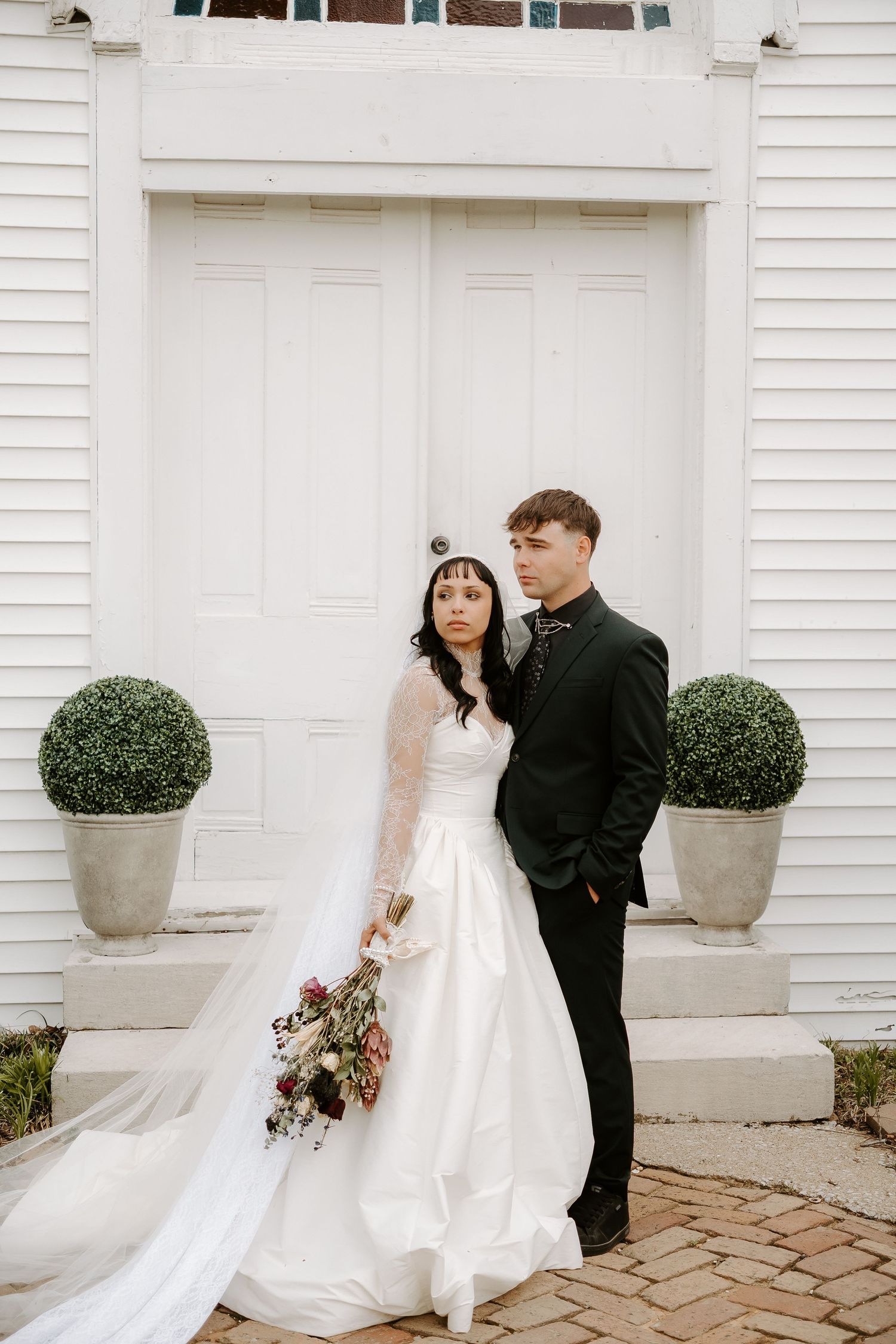 Bride and Groom looking off into the distance