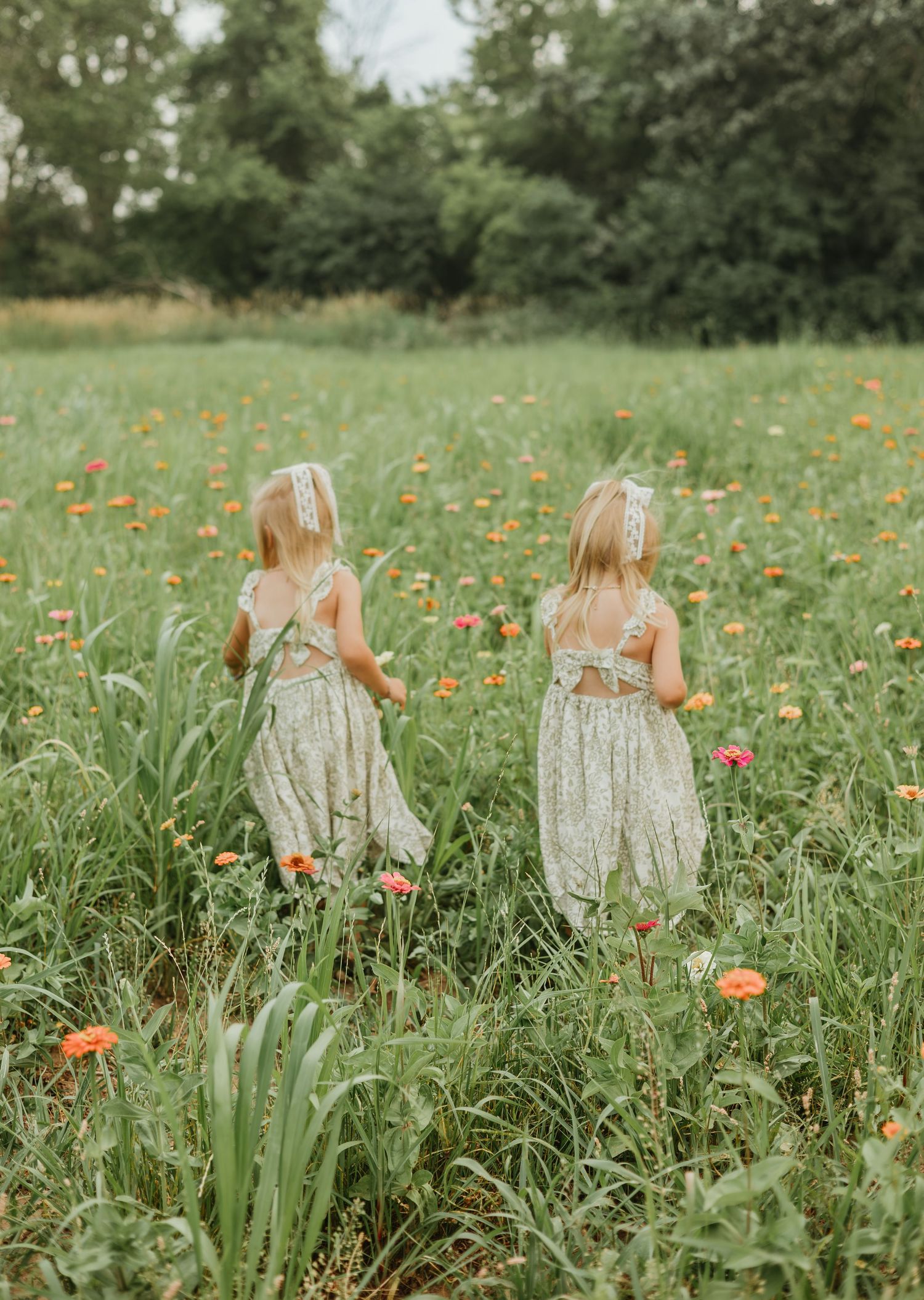 little girl wildflower field