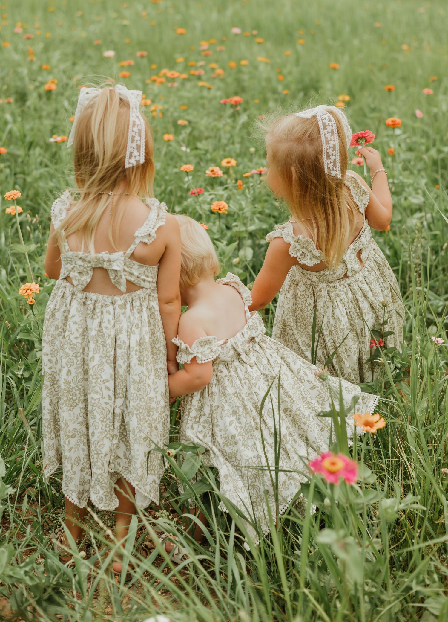 little girl wildflower field