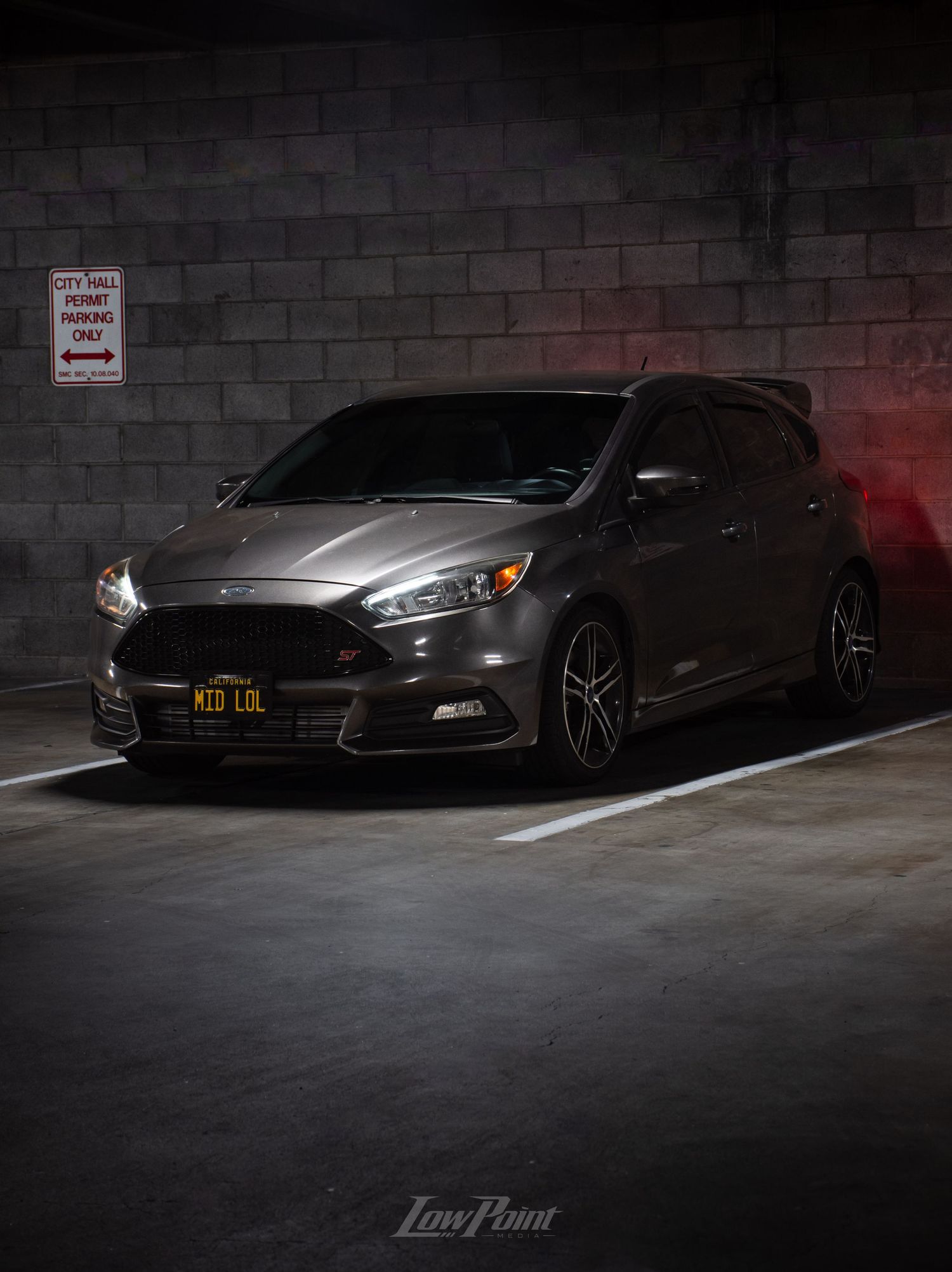 Magnetic Grey Ford Focus ST photographed in parking garage under a moody light