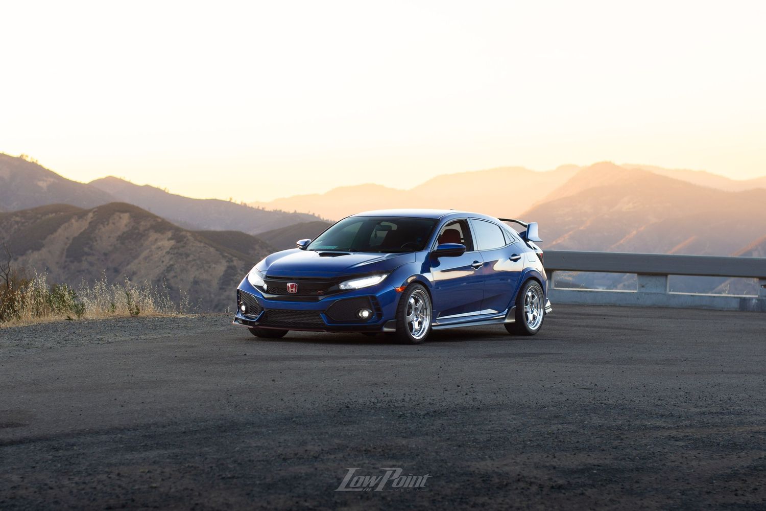 Blue Honda Civic Type-R photographed with GMR wheels at golden hour from a high vista point