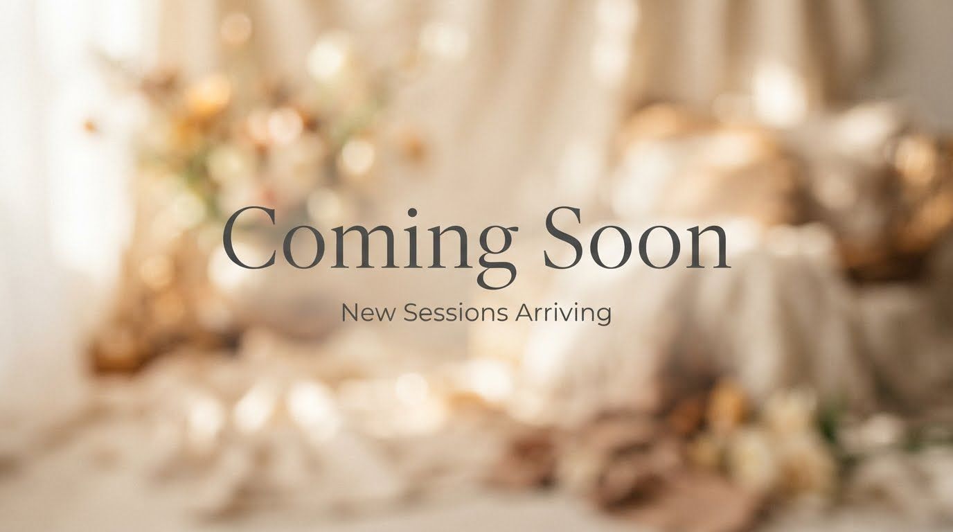 Elegant coming soon announcement with soft neutral tones and floral decor for new photography sessions.