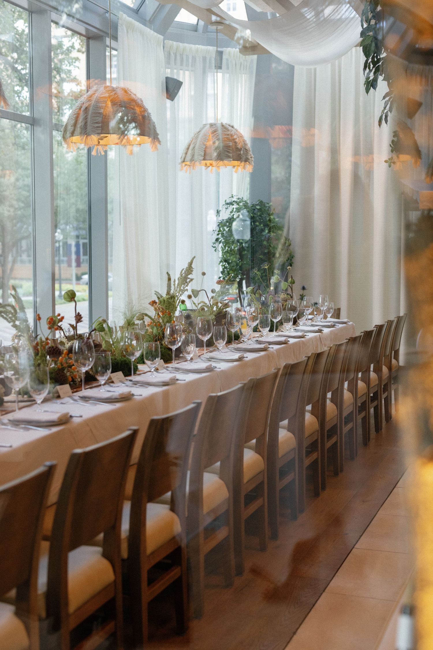 Elegant long dining table set for a formal event with  for Dallas Corporate Event Photography