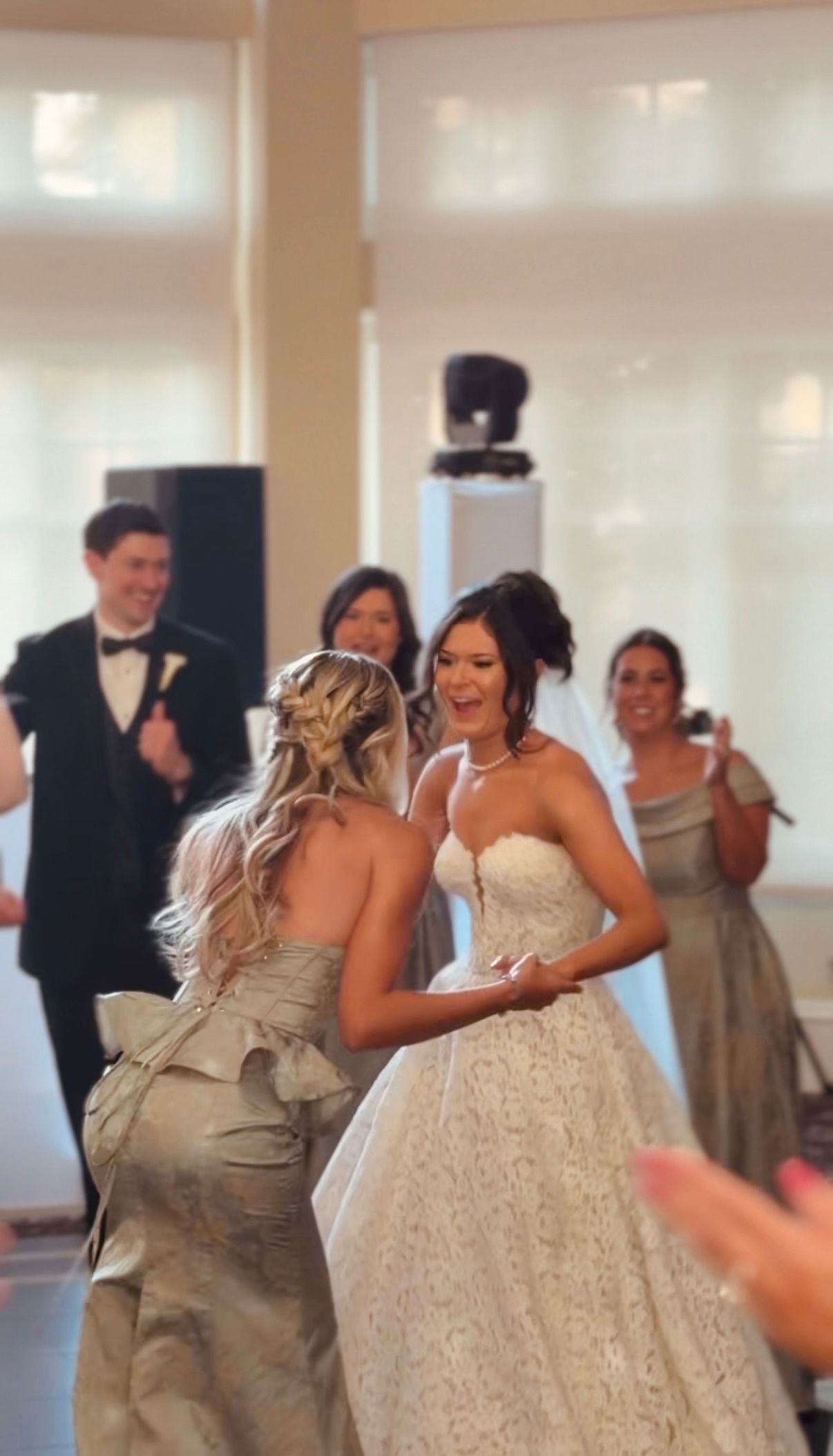Bride & Bridesmaid Dancing