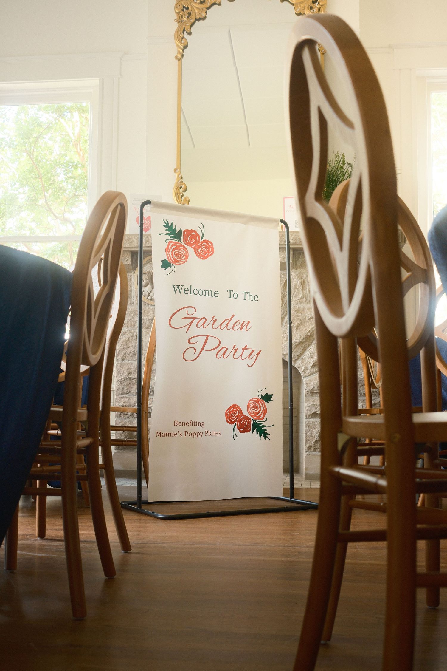 An event banner in-between chairs.