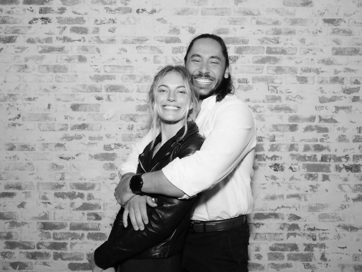 Candid shots of people embracing and laughing together against brick wall.