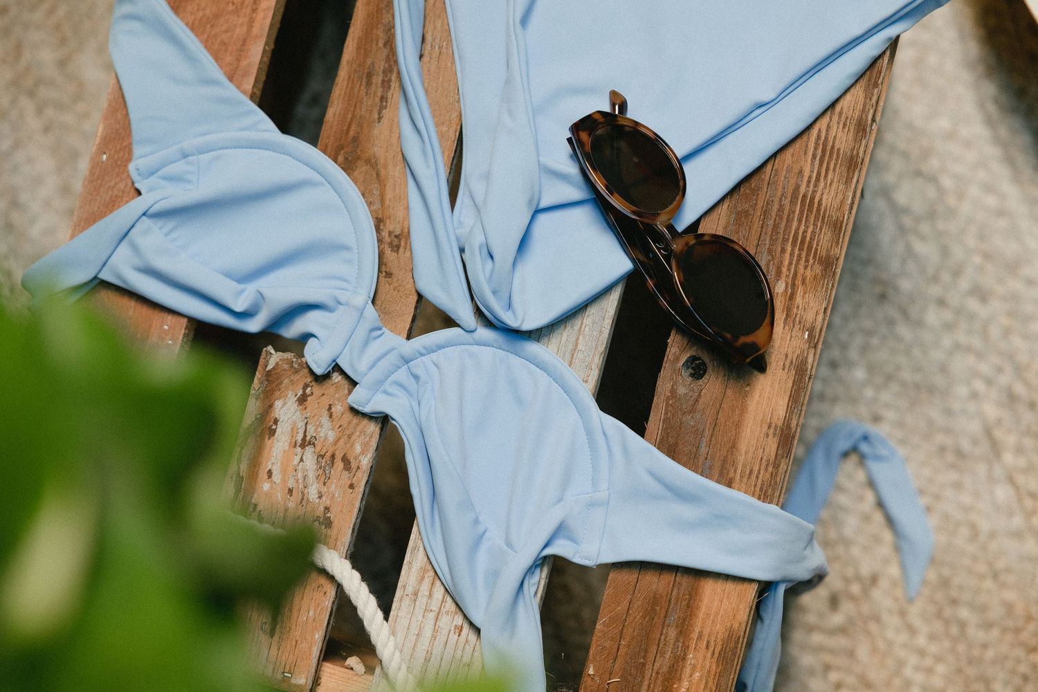Light blue loungewear set displayed against a wooden backdrop.
