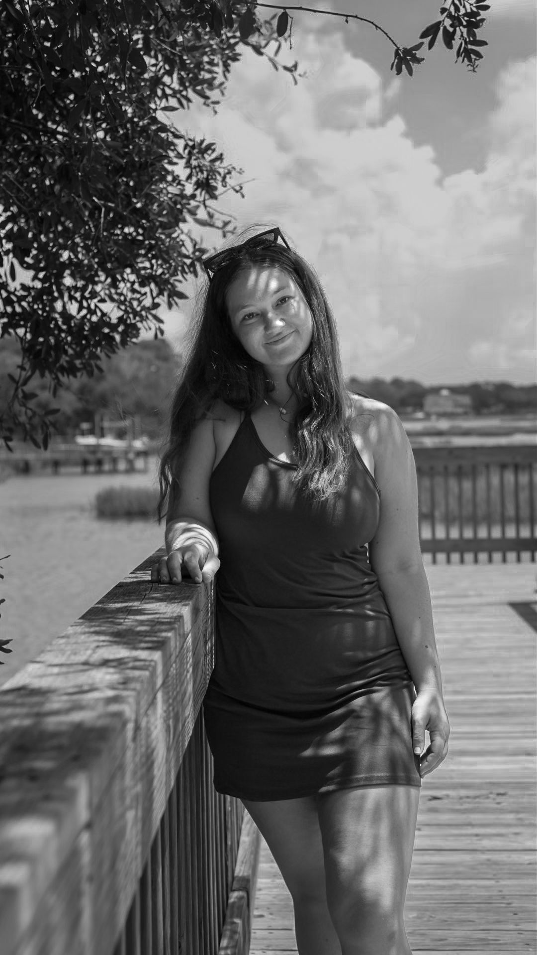 Woman standing on dock