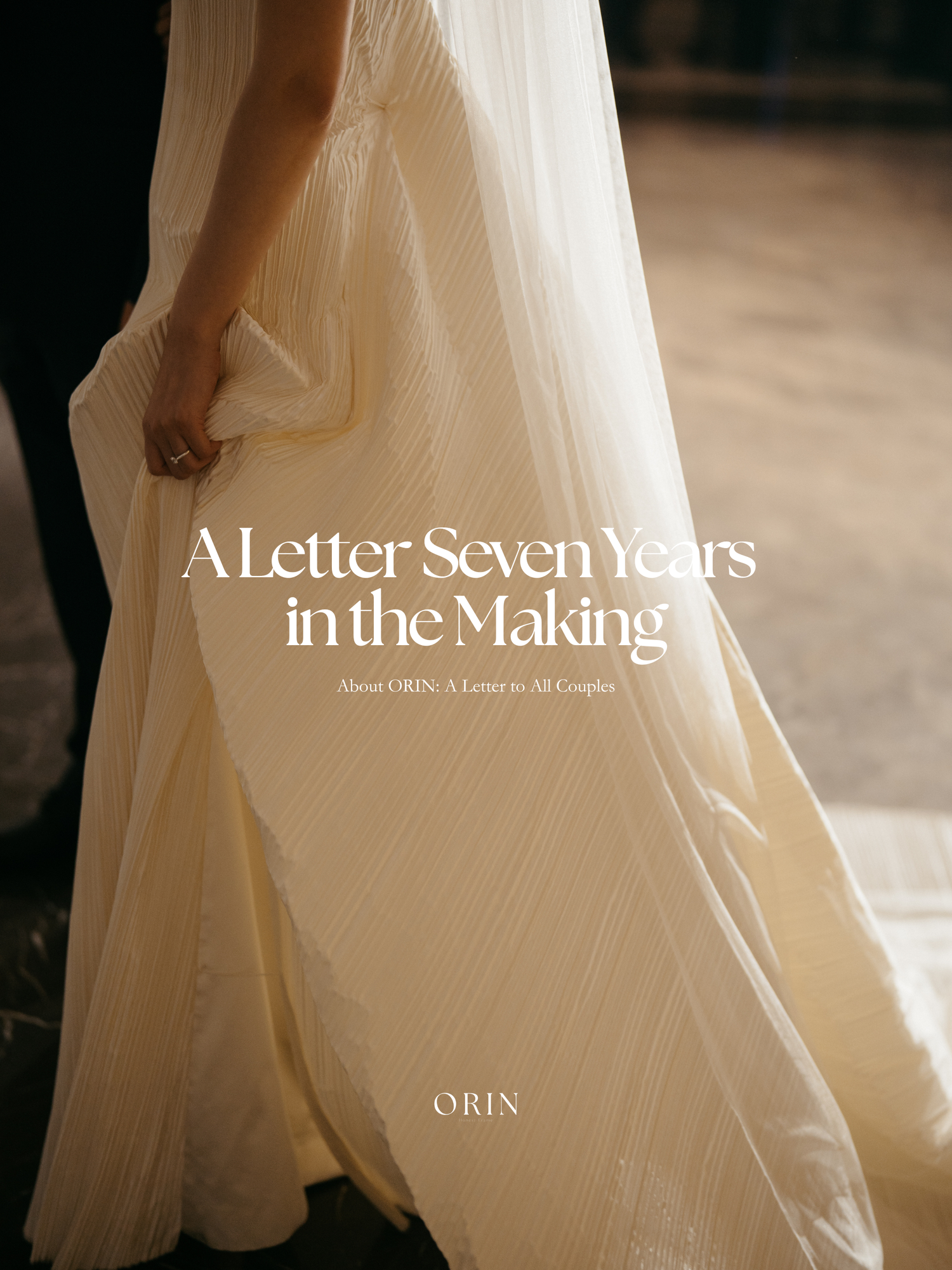 Elegant bride in a flowing ivory wedding gown holding her dress, with text overlay reading A Letter Seven Years in the Making by ORIN.