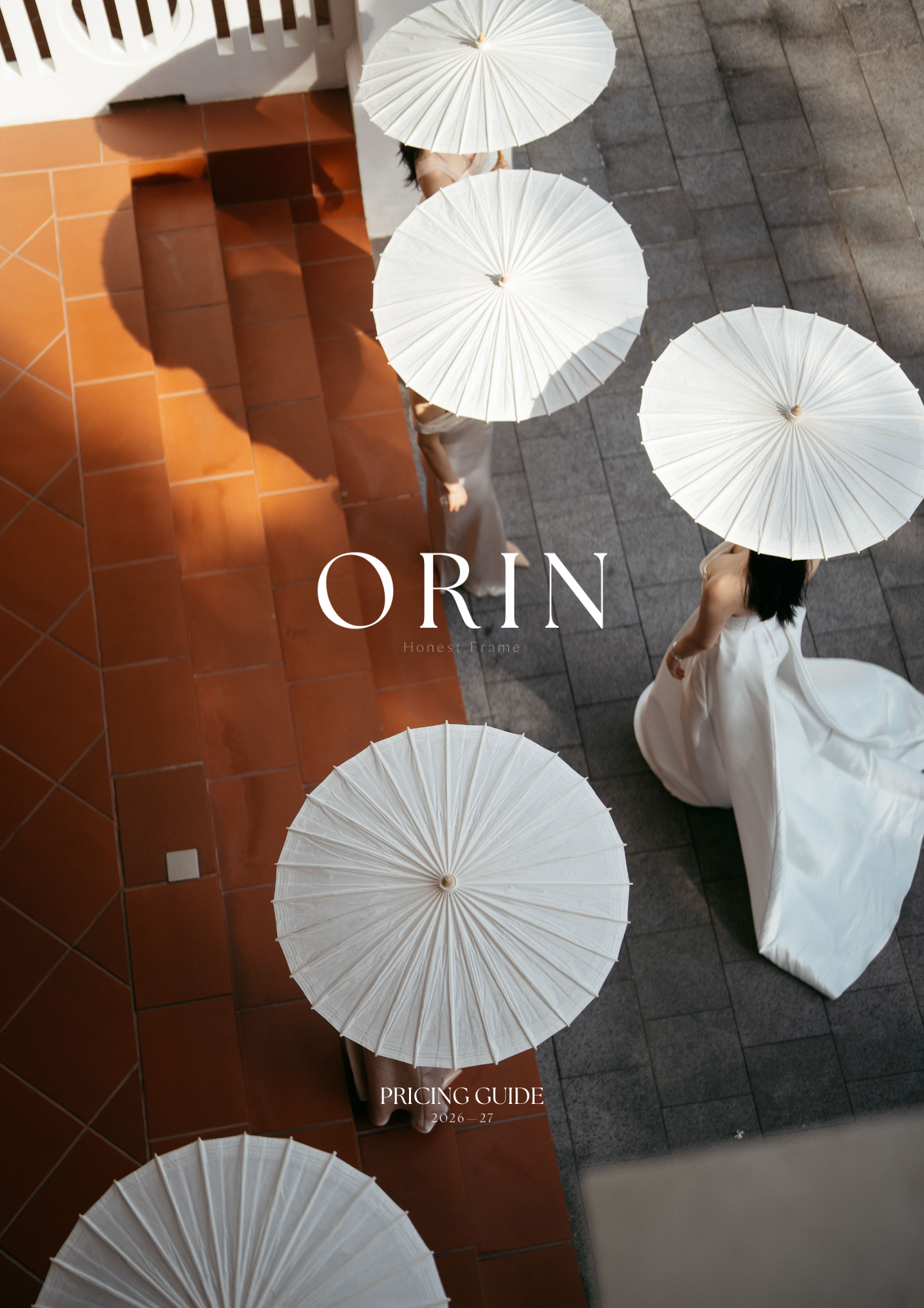 Aerial view of people holding white paper parasols on terracotta tiles, ORIN Pricing Guide cover.