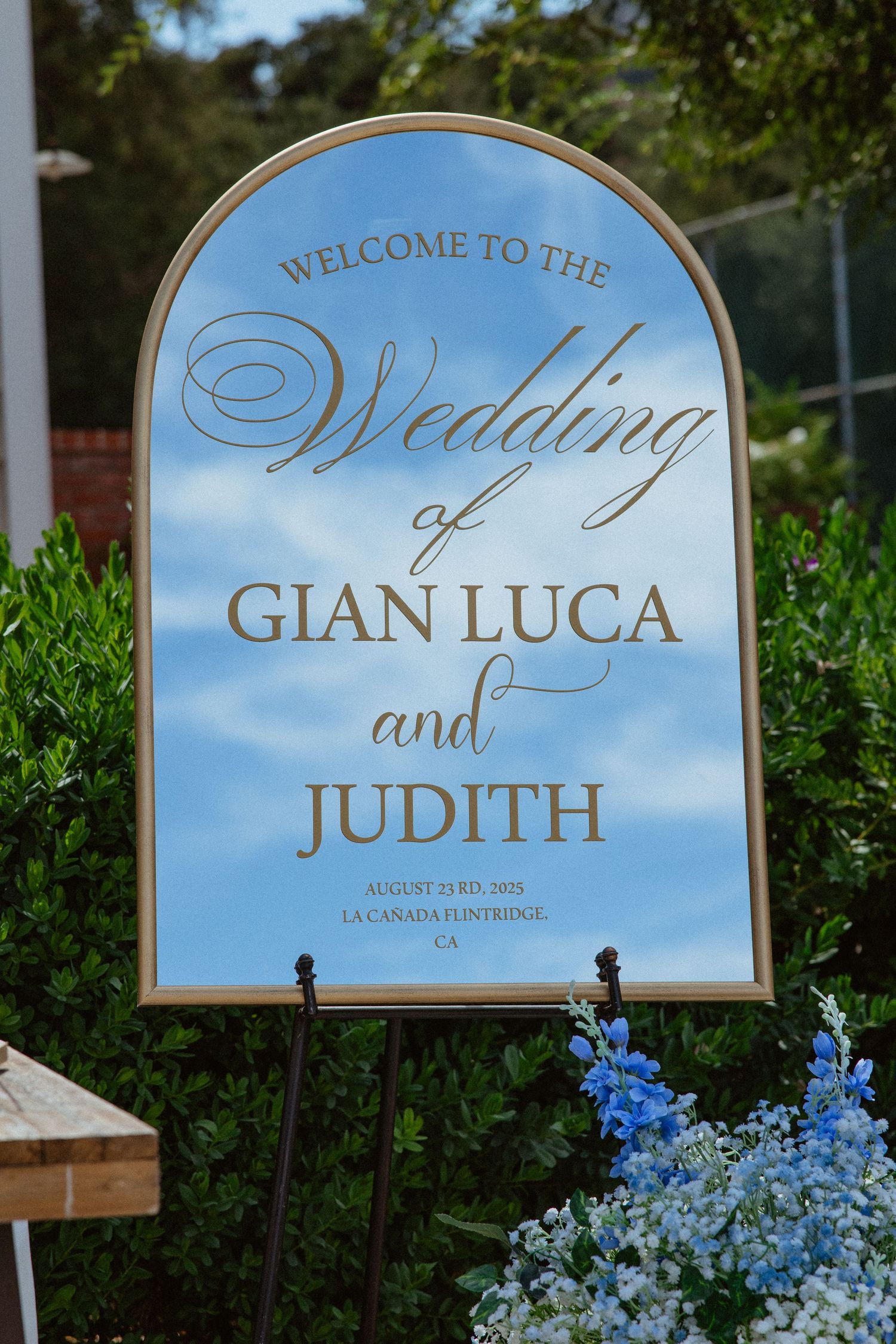 Gold-framed mirror wedding welcome sign for Gian Luca and Judith, August 23, 2025, La Canada Flintridge CA.