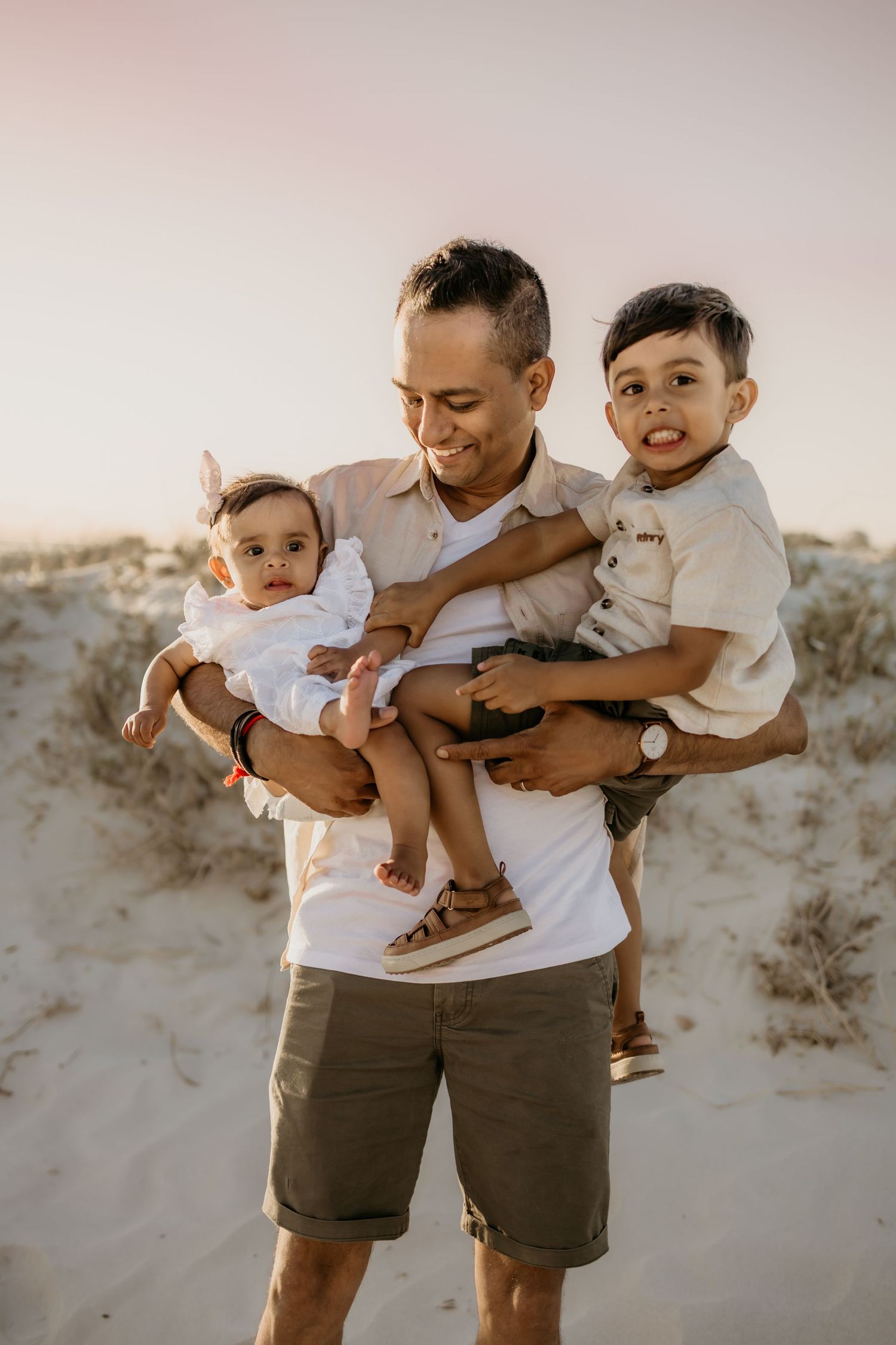 Beach family photoshoot in Strand at golden hour.

Sunset family photography in Cape Town.
Family travel photography