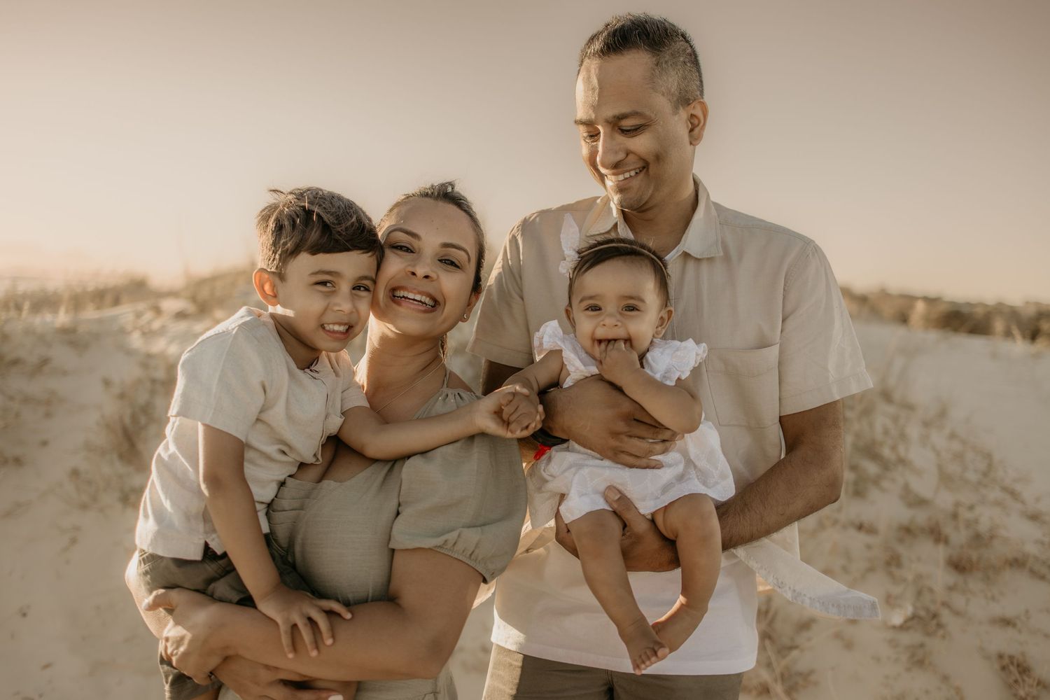 Beach family photoshoot in Strand at golden hour.
Sunset family photography in Cape Town.
Family travel photograph
