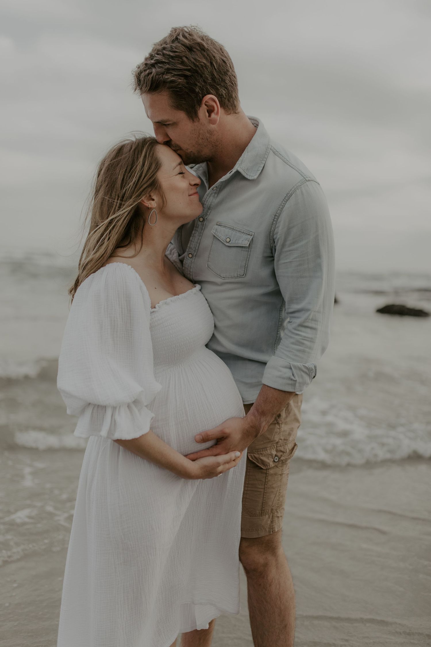 Natural maternity session in Strand with beautiful light, movement and authentic pregnancy portraits. Cape Town